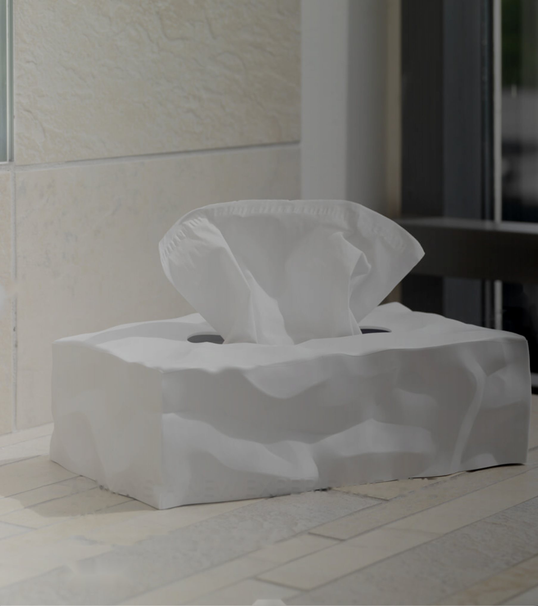 Wipy 2 tissue box on a tiled floor